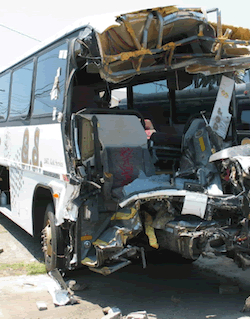 Bus mangled by bomb.