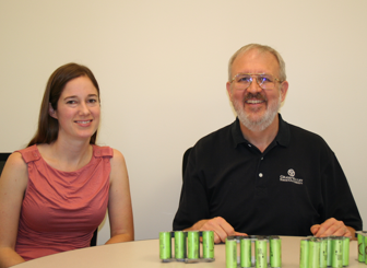 Prof. Lindsay Corneal and Dr. Charles Standridge work with unassembled lithium-ion battery packs.