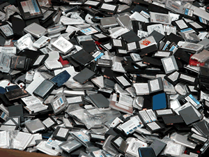 Large pile of used cellphone batteries