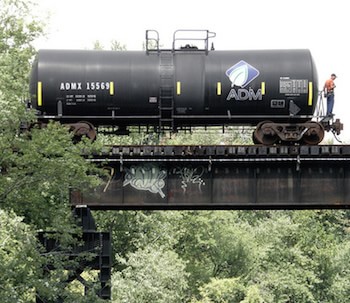 Freight rail car on bridge over Passic River.