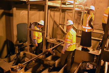 Tour group inside the San Francisco Bay Bridge under construction.